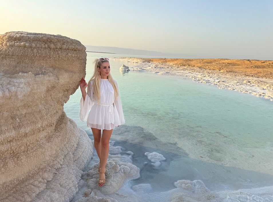 Dead Sea shoreline with salt crystal formations and turquoise water in Jordan