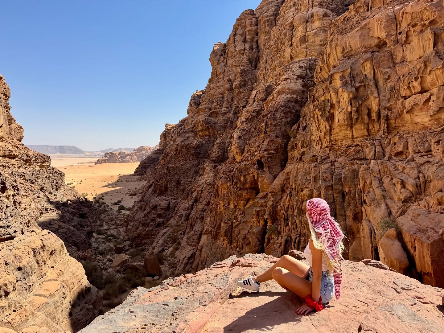 Dramatic red sandstone cliffs of Wadi Rum desert landscape in southern Jordan